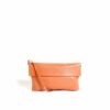 LUMI Julia Midi Clutch, in cognac, is made of vegetable tanned goat leather. This clutch is nice an petite but still big enough to fit everything you might need for your evening out.