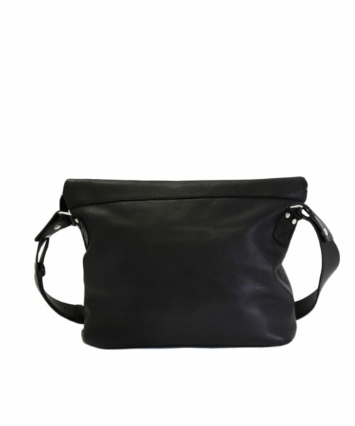 LUMI Theodore Messenger Bag, in black, is created using vegetable tanned leather.
