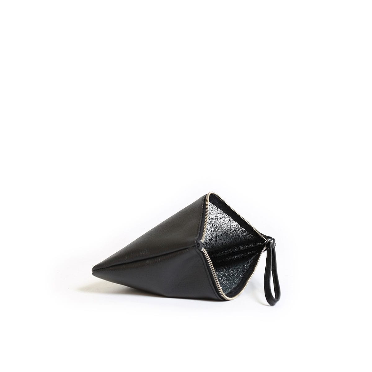 LUMI Raili Small Clutch, in black/silver, is from our Limited Edition. Raili makes a petite and functional accessory for your little daily essentials.