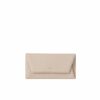 LUMI Talvikki Envelope Wallet in fresh taupe and sorbet combo. This wallet is perfect for daily use to safe-keep your cards and cash. Or use it as a clutch with your evening wear. The wallet is handmade from lovely and soft sheep napa leather, which makes it beautiful to hold in your hand.