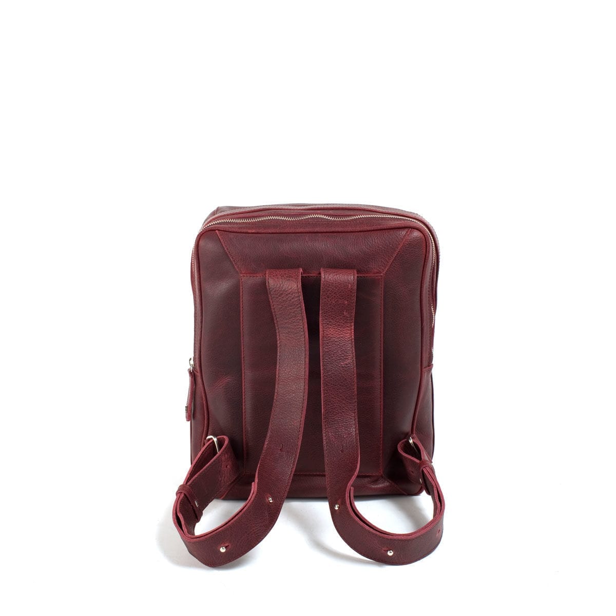LUMI Markus Tablet Backpack, in wine, is created using vegetable tanned, pull-up waxed leather.