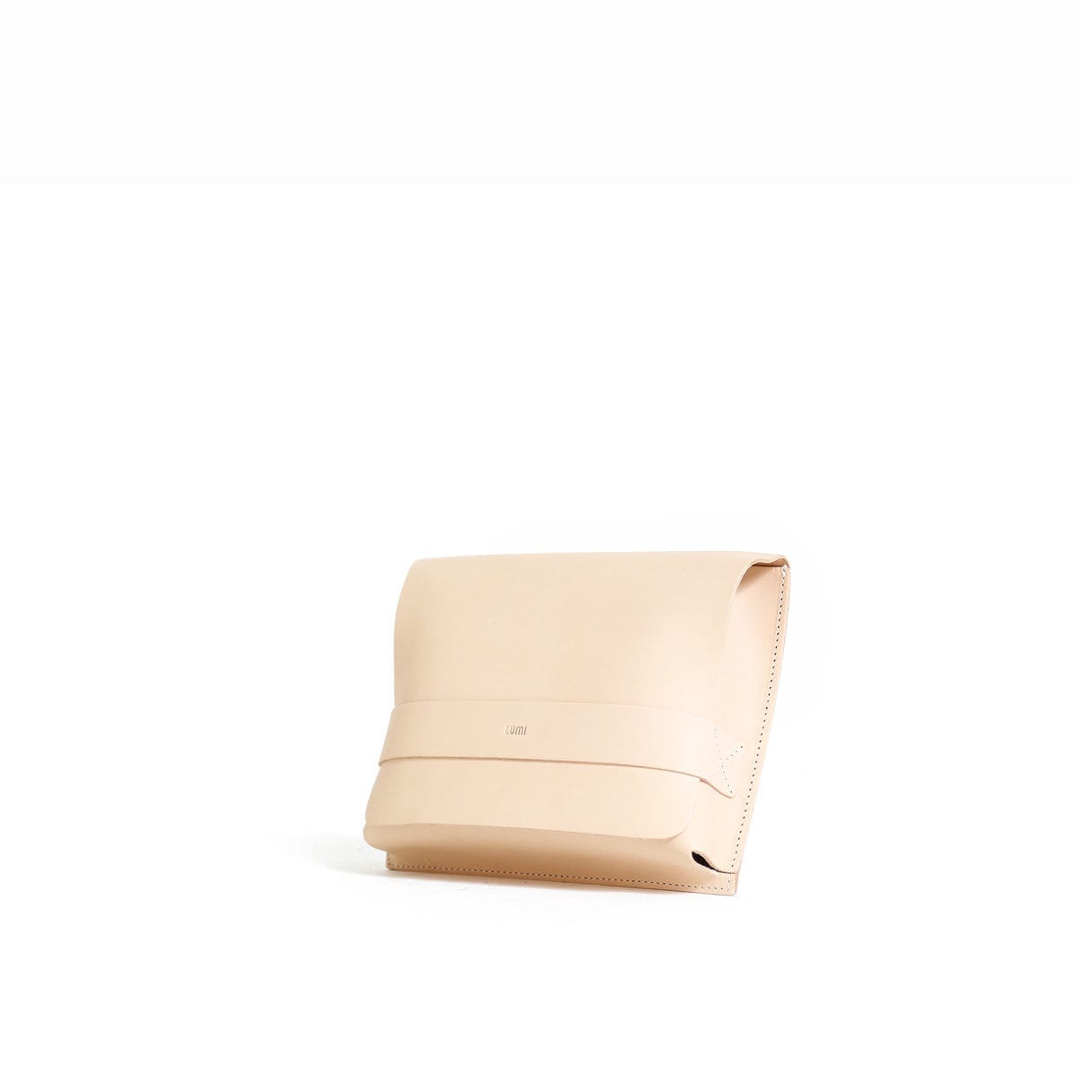 LUMI Medium Case Utility Pocket is created using natural vegetable tanned cow leather.