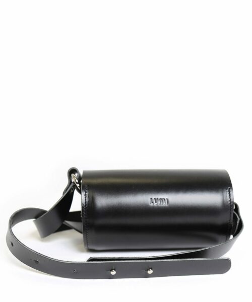 LUMI Aino Tube Bag, in black, is created using natural vegetable tanned cow leather.