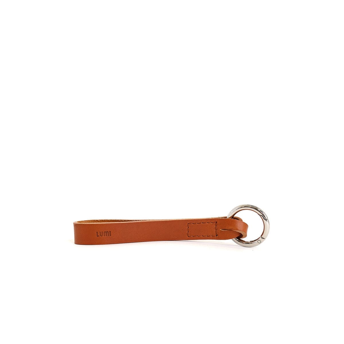 LUMI Alvar Key Holder, in cognac, is created using natural vegetable tanned cow leather.
