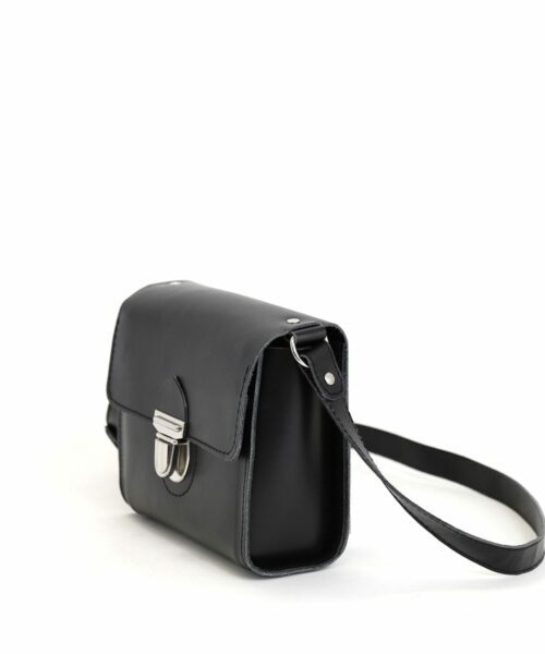 LUMI Hilla Messenger Bag, in black, is created using natural vegetable tanned cow leather.