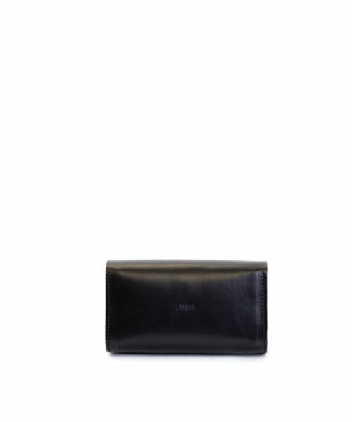 LUMI Kukka Evening Pouch, in black, is created using natural vegetable tanned cow leather. The color will naturally change over time.