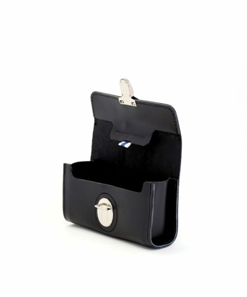 LUMI Kukka Evening Pouch, in black, is created using natural vegetable tanned cow leather. The color will naturally change over time.