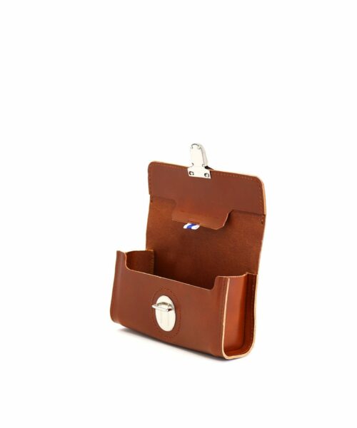 LUMI Kukka Evening Pouch, in cognac, is created using natural vegetable tanned cow leather