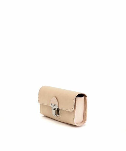 LUMI Kukka Evening Pouch is created using natural vegetable tanned cow leather. The color will naturally change over time.