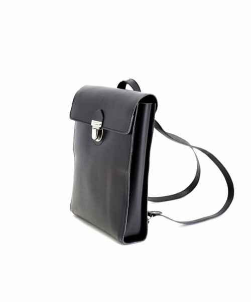 LUMI Oiva Backpack, in black, is created using natural vegetable tanned cow leather. The color will naturally change over time.