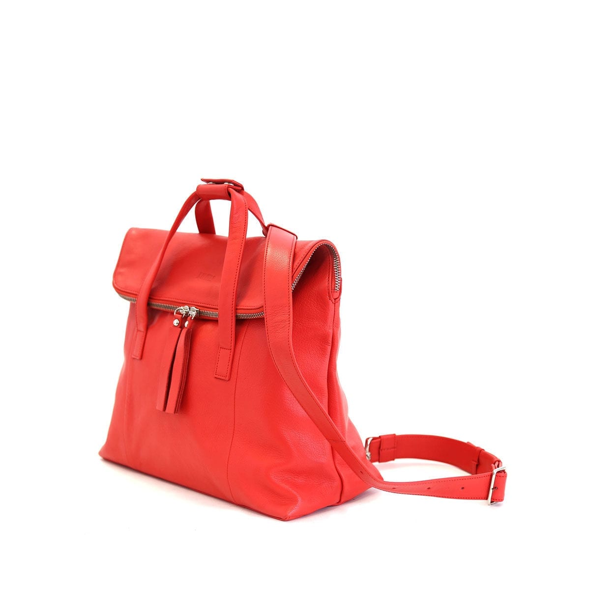 LUMI Saara Backpack, in coral is made of vegetable tanned goat leather. Chemical free dyeing.