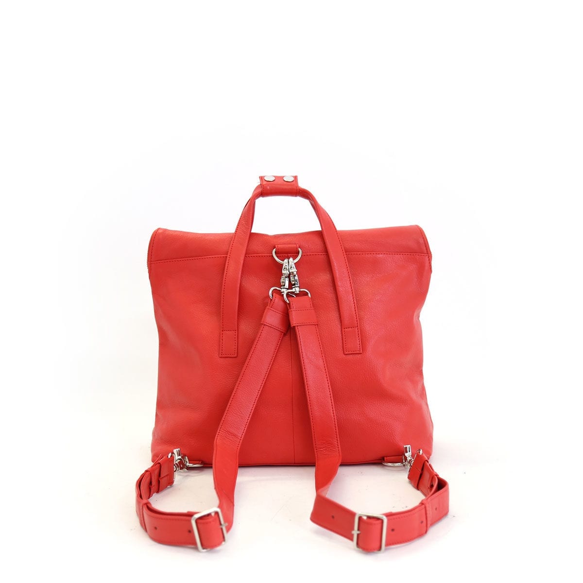 LUMI Saara Backpack, in coral is made of vegetable tanned goat leather. Chemical free dyeing.