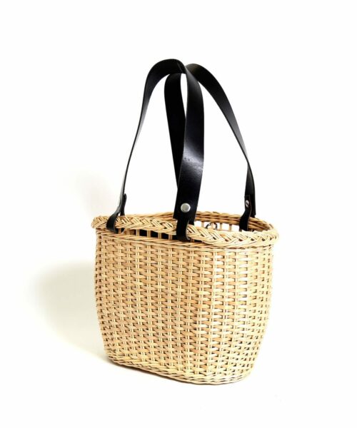 LUMI Wicker Basket, in black, makes a perfect companion to the beach. Or a picnic in the park.