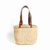 LUMI Wicker Basket, in cognac, makes a perfect companion to the beach. Or a picnic in the park.