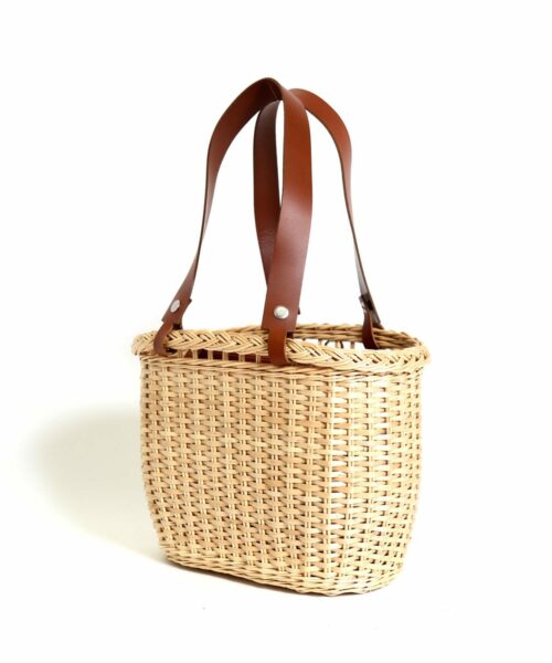 LUMI Wicker Basket, in cognac, makes a perfect companion to the beach. Or a picnic in the park.