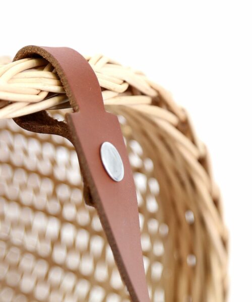 LUMI Wicker Basket, in cognac, makes a perfect companion to the beach. Or a picnic in the park.