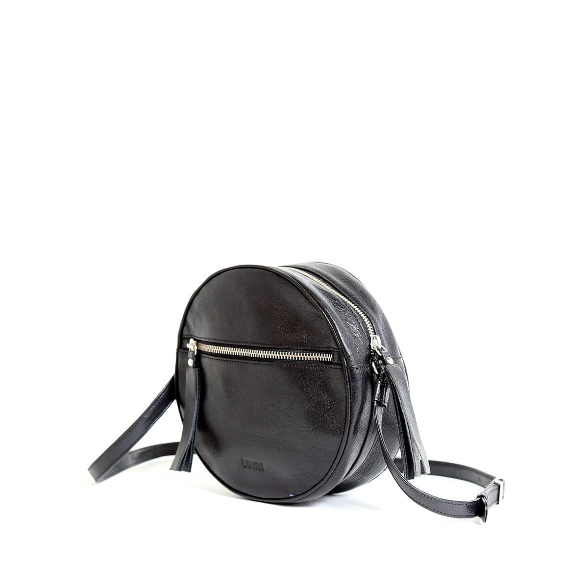 LUMI Lila Round Bag, in black, is made of vegetable tanned goat leather.