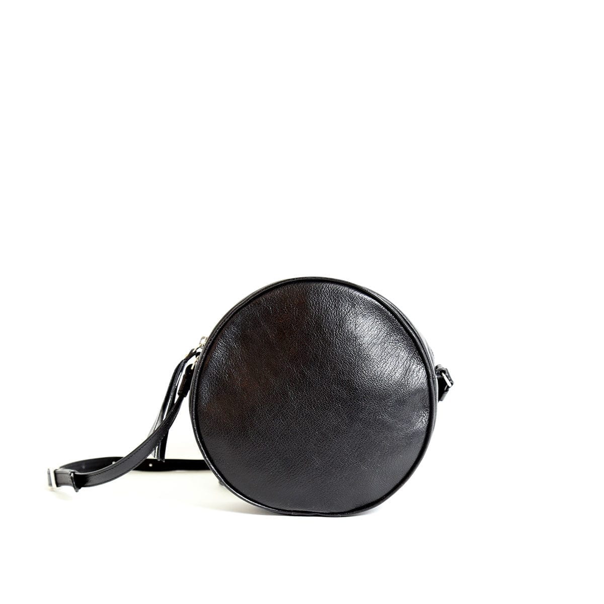 LUMI Lila Round Bag, in black, is made of vegetable tanned goat leather.