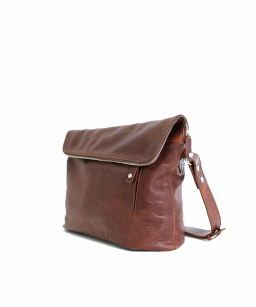 LUMI Theodore Messenger Bag in toffee brown. Theodore is created using vegetable tanned leather, so it is both handsome and ecological.