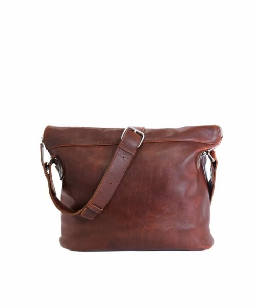 LUMI Theodore Messenger Bag in toffee brown. Theodore is created using vegetable tanned leather, so it is both handsome and ecological.
