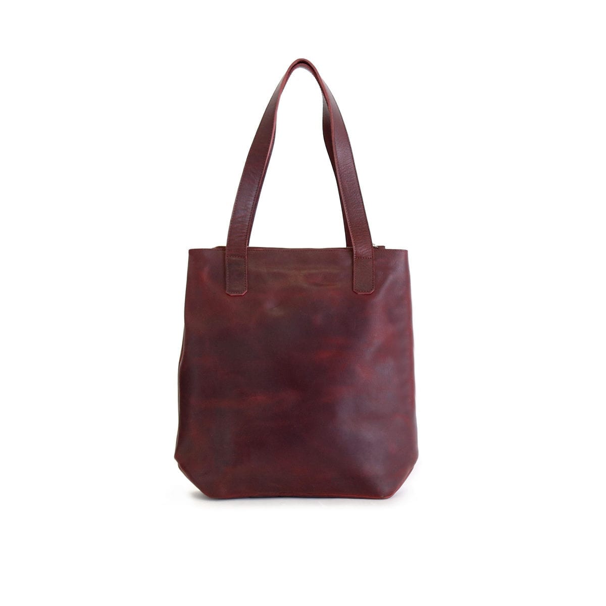 LUMI Lars Open Tote, in wine. Created using vegetable tanned leather.