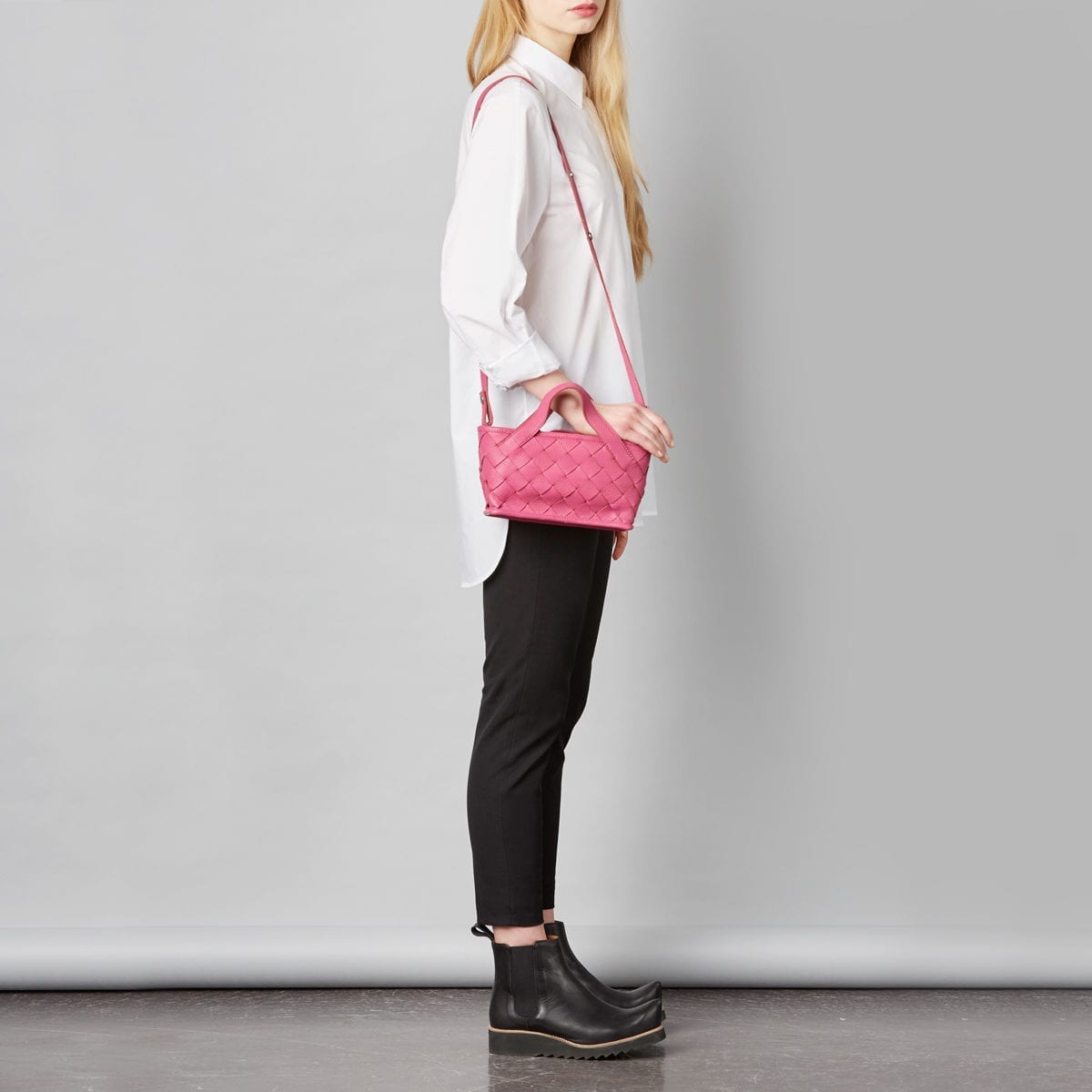 LUMI Annikki Woven Small Tote in bright raspberry colour. This cute and petite tote bag with woven textured details adds a playful twist to your daily style