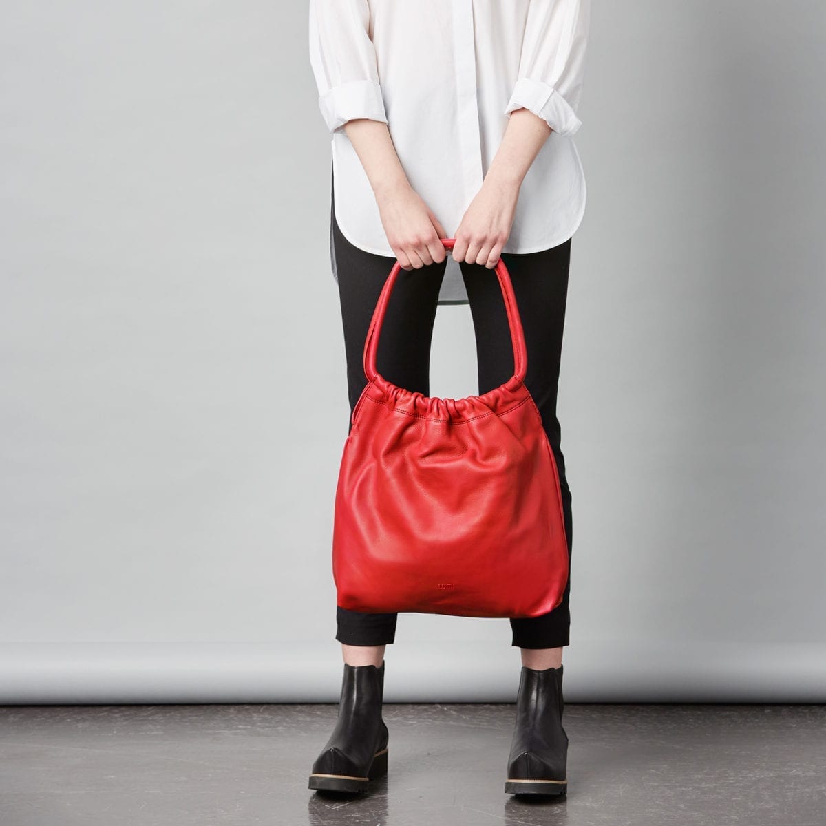 Martta Drawstring Bag in bright and bold red.